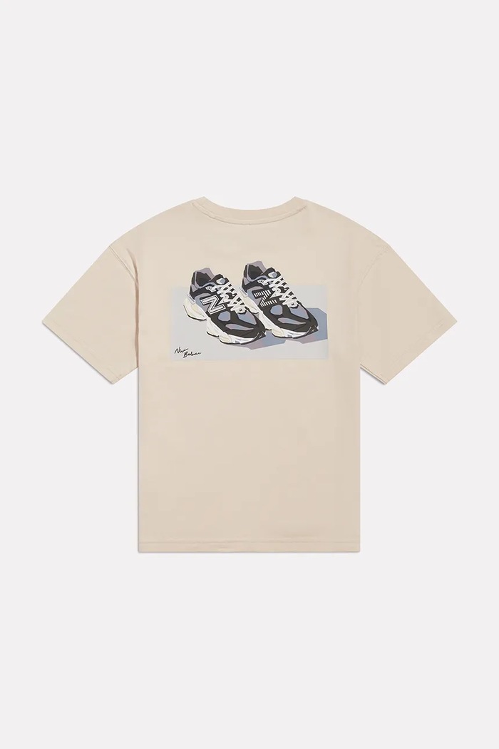 New Balance T-shirt dziecięcy bawełniany YT62O31X beżowy AW26