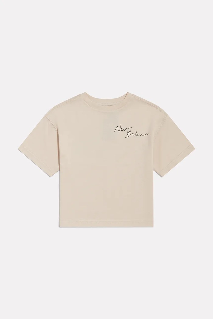 New Balance T-shirt dziecięcy bawełniany beżowy YT62J1FR