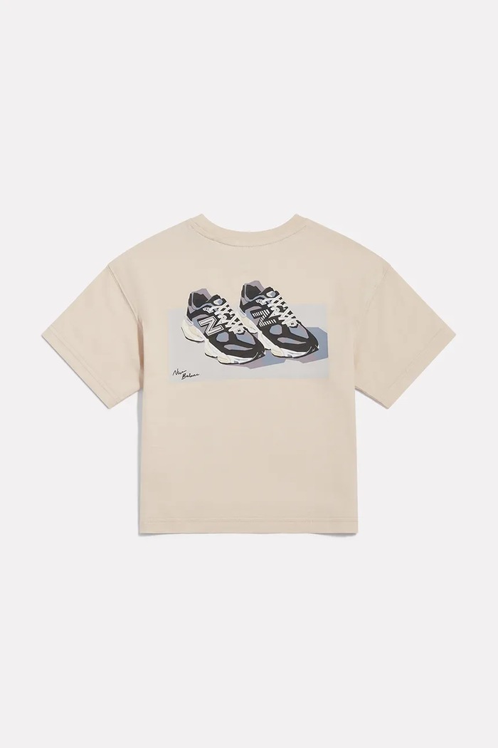 New Balance T-shirt dziecięcy bawełniany YT62J1FR beżowy AW26