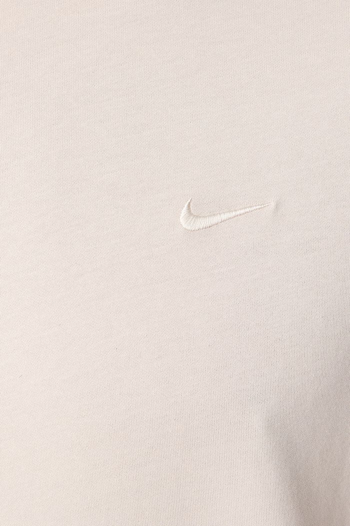 T-shirt sportowy męski z bawełną Primary Dri-FIT Nike beżowy DV9831.104