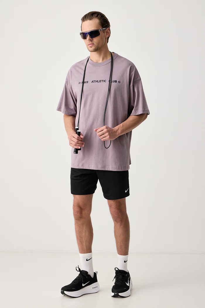 Nike T-shirt męski bawełniany N.A.C. IM6139.524 fioletowy AW26