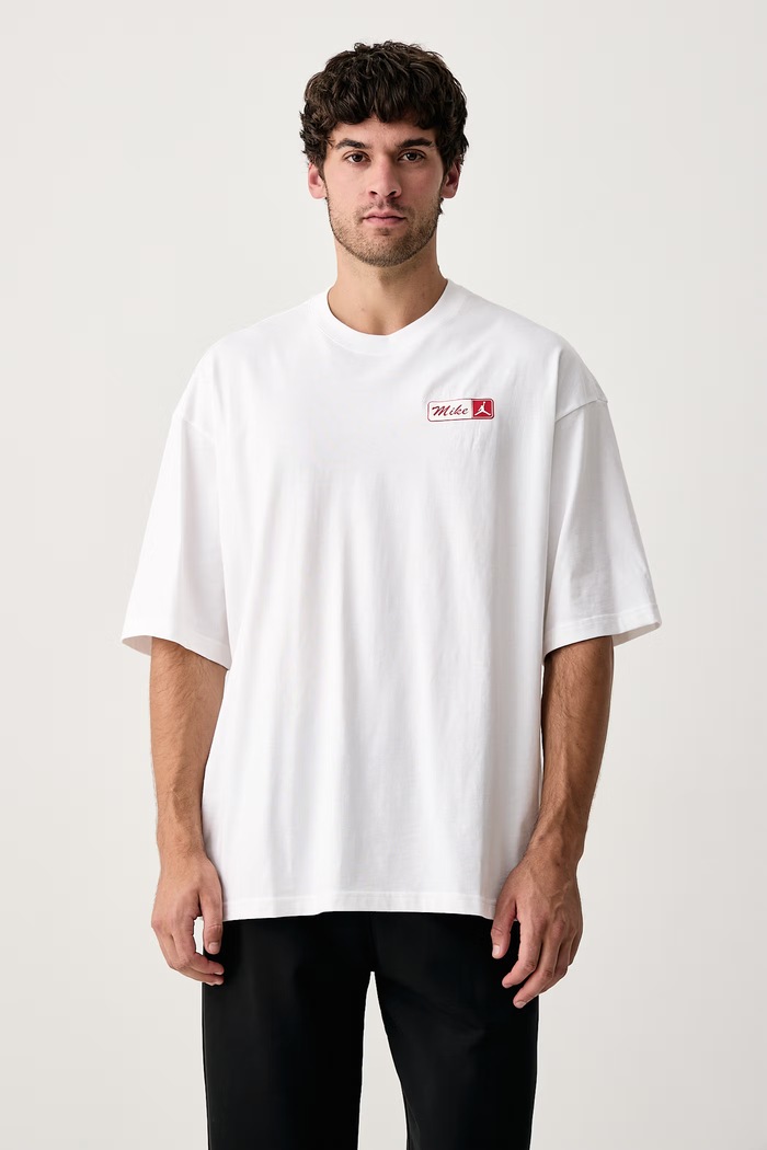 Odzież Jordan T-shirt męski bawełniany Brooklyn IX5406.100 biały