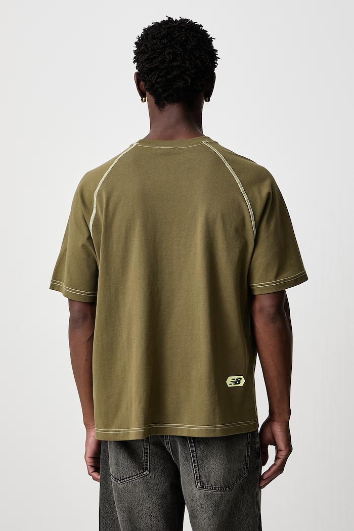 Odzież New Balance T-shirt oversize bawełniany męski MT62T1JVAAO zielony