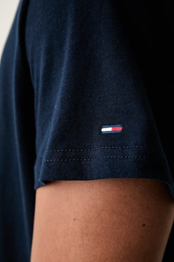 Tommy Jeans majica ženska pamučna DM0DM23545 mornarsko plava