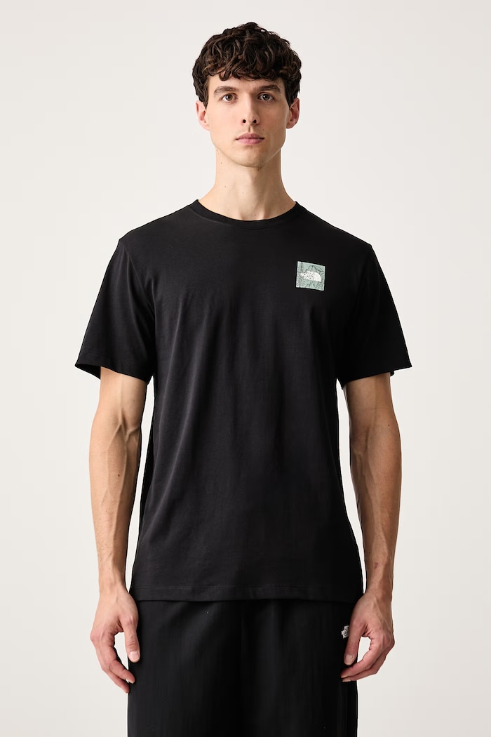 Ρούχα The North Face T-shirt ανδρικό με βαμβάκι Monte NF0A8JAVJK31 μαύρο