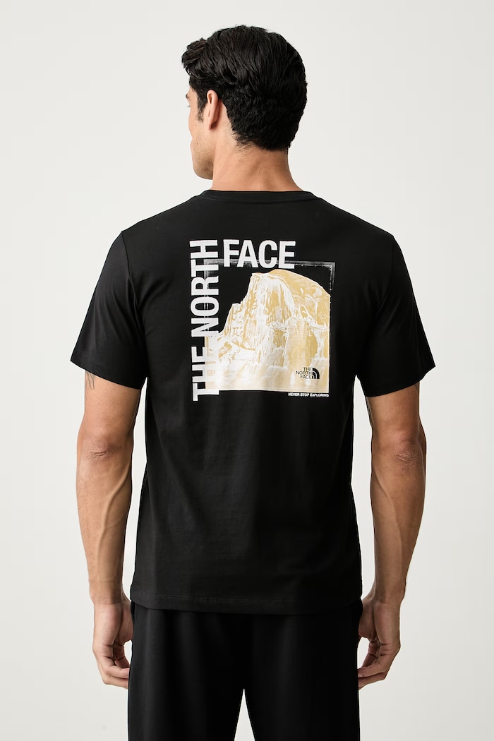 The North Face kratka majica moška z bombažem GRAPHIC črna NF0A8GV0JK31