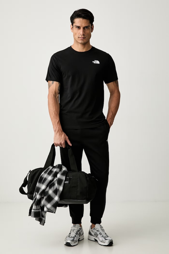 The North Face kratka majica moška z bombažem GRAPHIC NF0A8GV0JK31 črna AW26