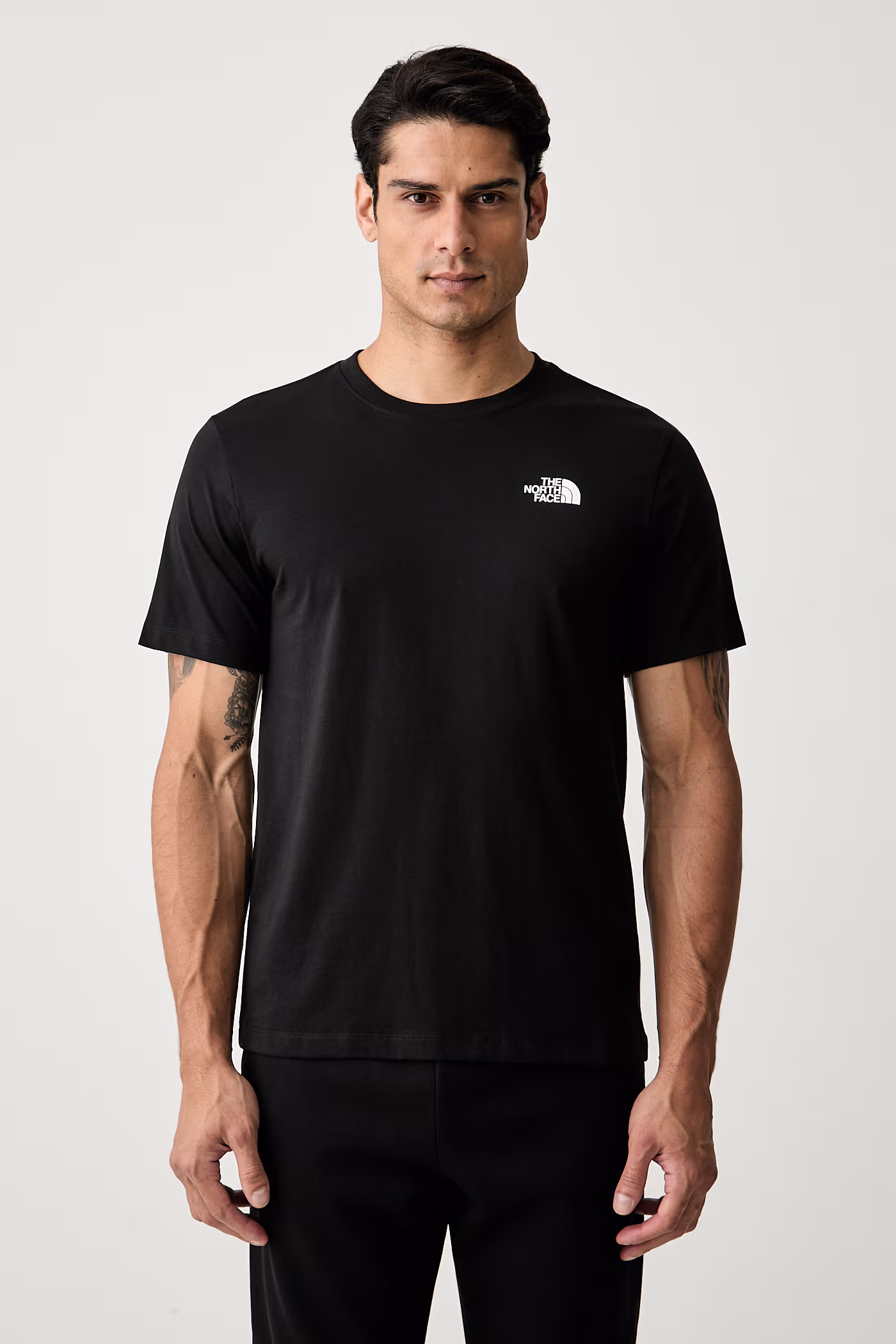 Oblačila The North Face kratka majica moška z bombažem GRAPHIC NF0A8GV0JK31 črna