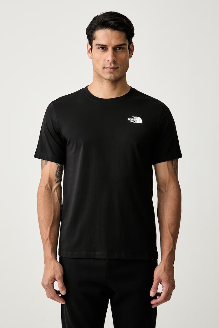Oblačila The North Face kratka majica moška z bombažem GRAPHIC NF0A8GV0JK31 črna