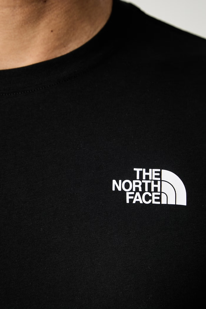 The North Face kratka majica moška z bombažem GRAPHIC NF0A8GV0JK31 črna