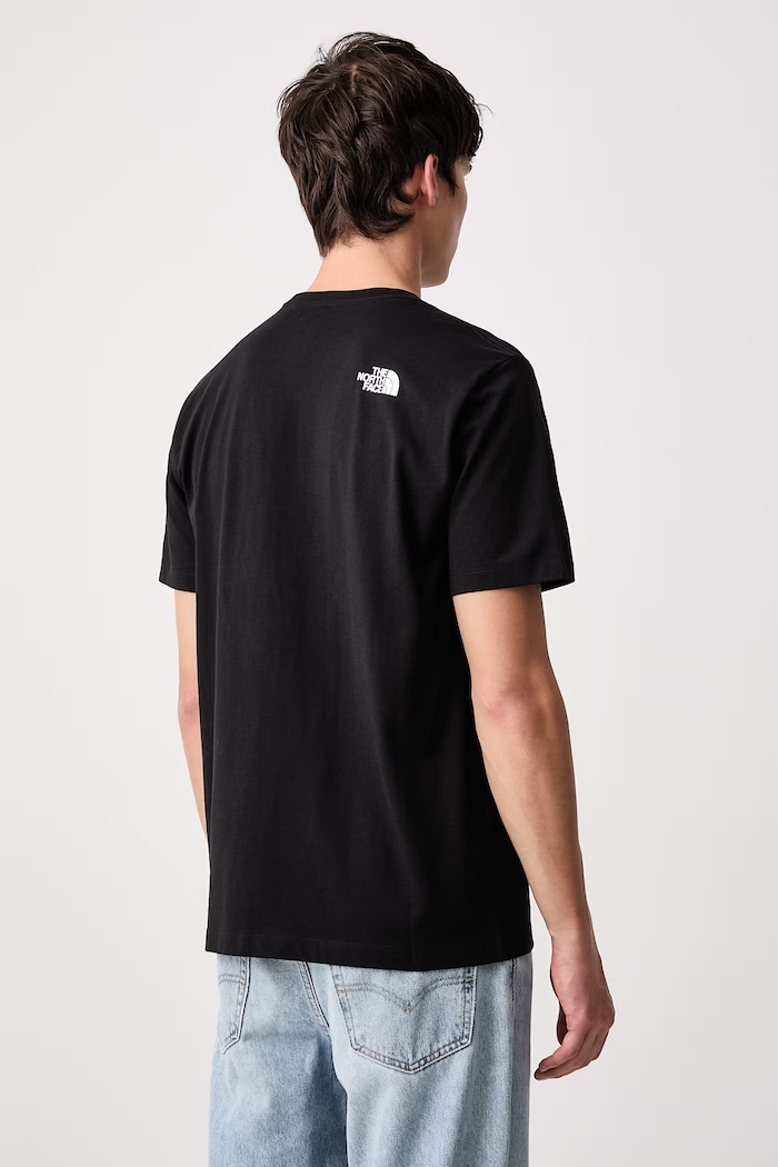 Ρούχα The North Face T-shirt ανδρικό με βαμβάκι GRAPHIC NF0A8GUVKY41 μαύρο