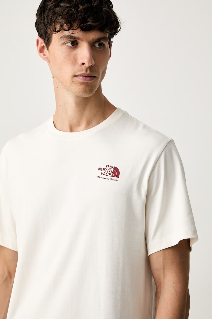 The North Face kratka majica moška bombažna Relaxed bež NF0A8JACQLI1