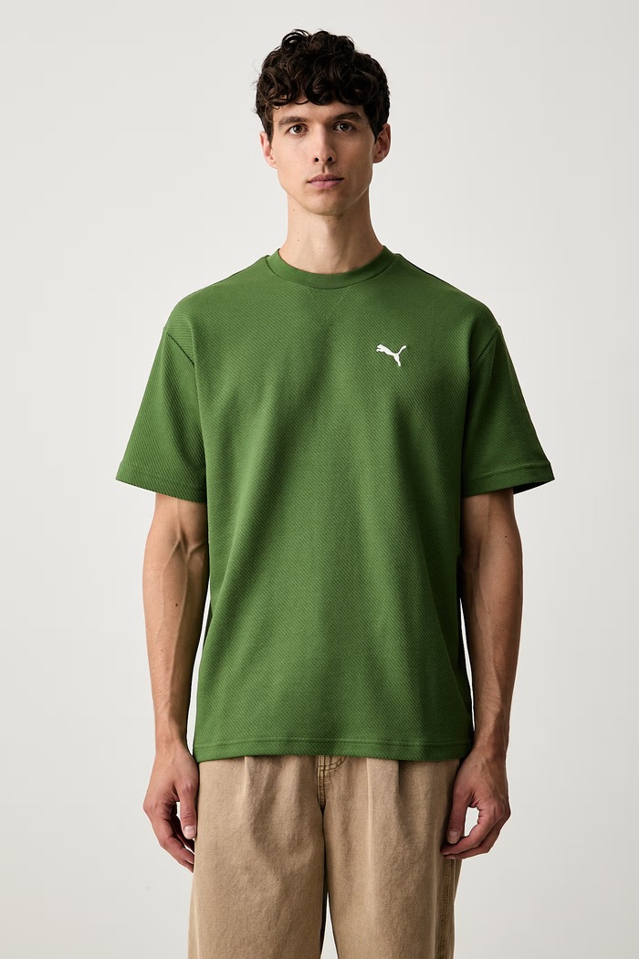 Puma T-shirt męski z bawełną Essentials Elevated zielony 694307