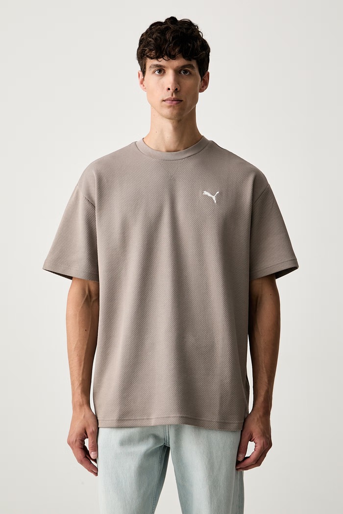 Puma T-shirt męski z bawełną Essentials Elevated beżowy 694307