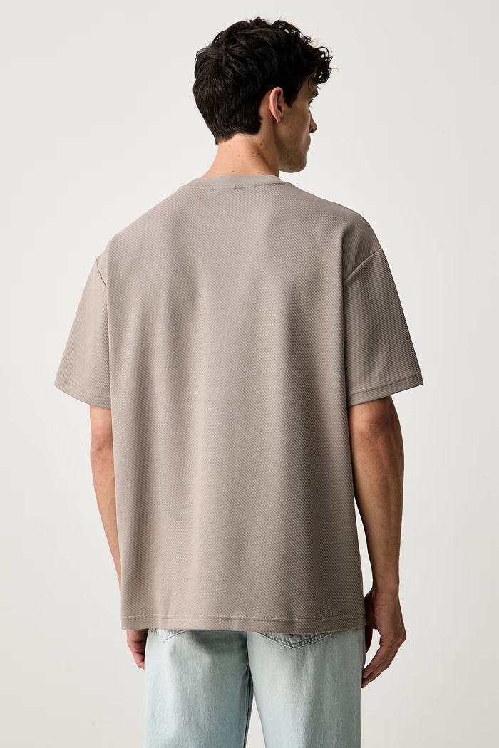 Odzież Puma T-shirt męski z bawełną Essentials Elevated 694307 beżowy