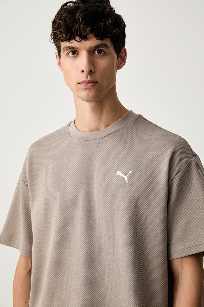 Puma T-shirt męski z bawełną Essentials Elevated beżowy 694307