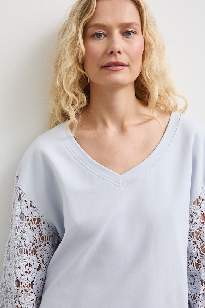 Bluza damska z ażurowymi wstawkami niebieski RS26-BLDB01