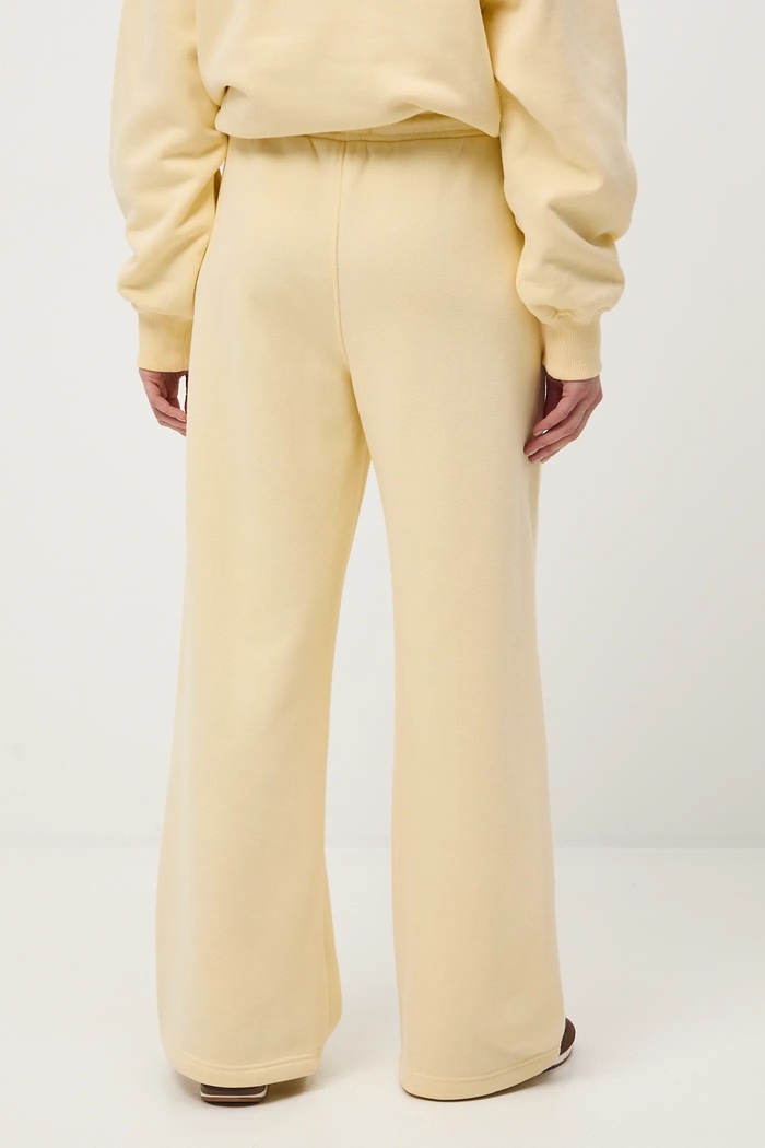 Odzież Spodnie dresowe damskie wide leg RS26-SPD011 żółty