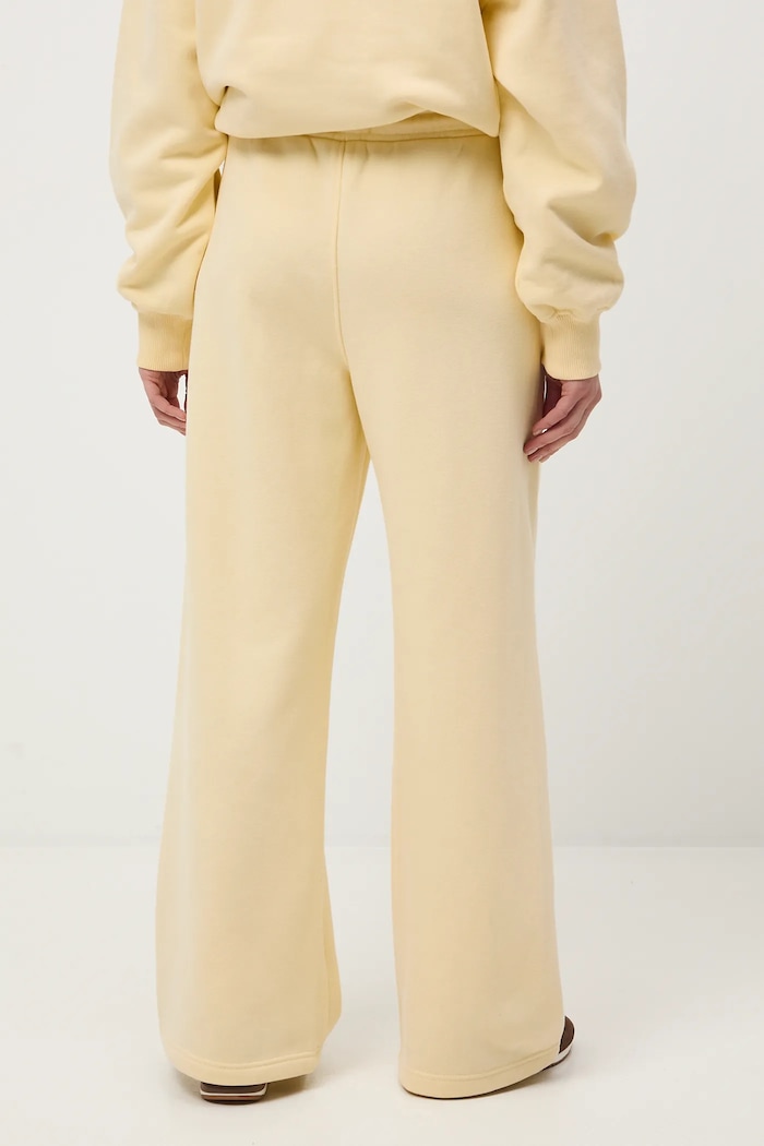 Odzież Spodnie dresowe damskie wide leg RS26-SPD011 żółty