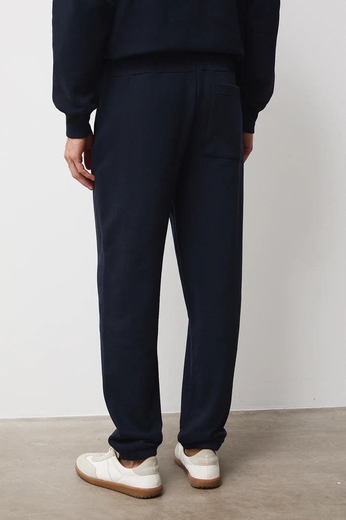Odzież Spodnie dresowe męskie jogger gładkie RS26-SPM011 granatowy