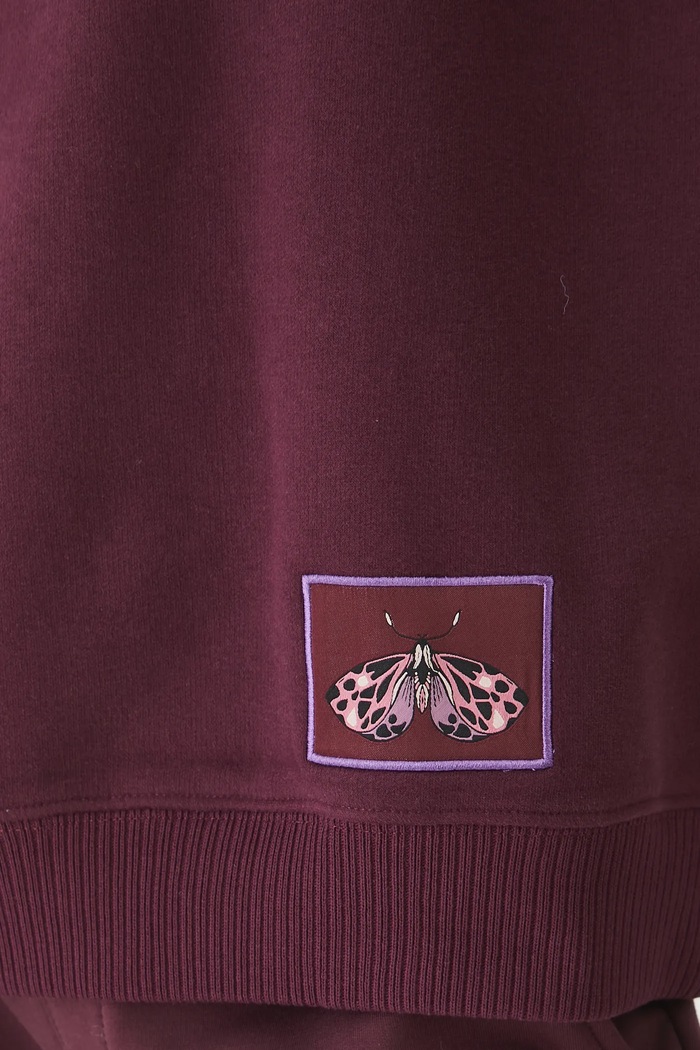 Bluza damska z ozdobną naszywką RW25-BLD011