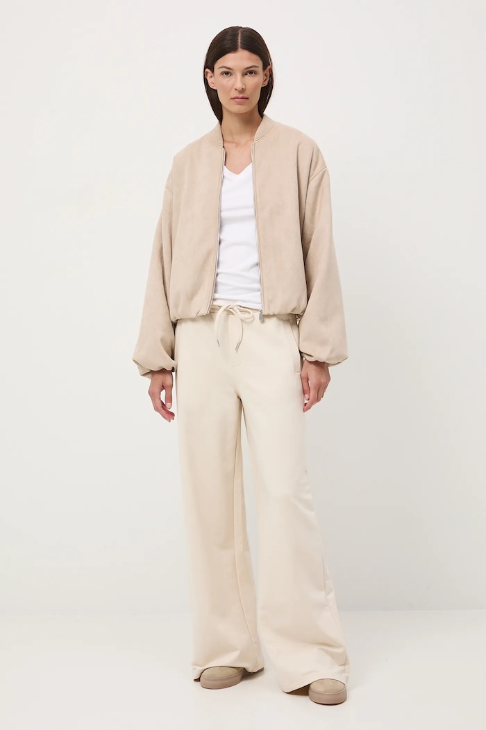 Spodnie dresowe damskie wide leg z elastanem beżowy RW25-SPD307
