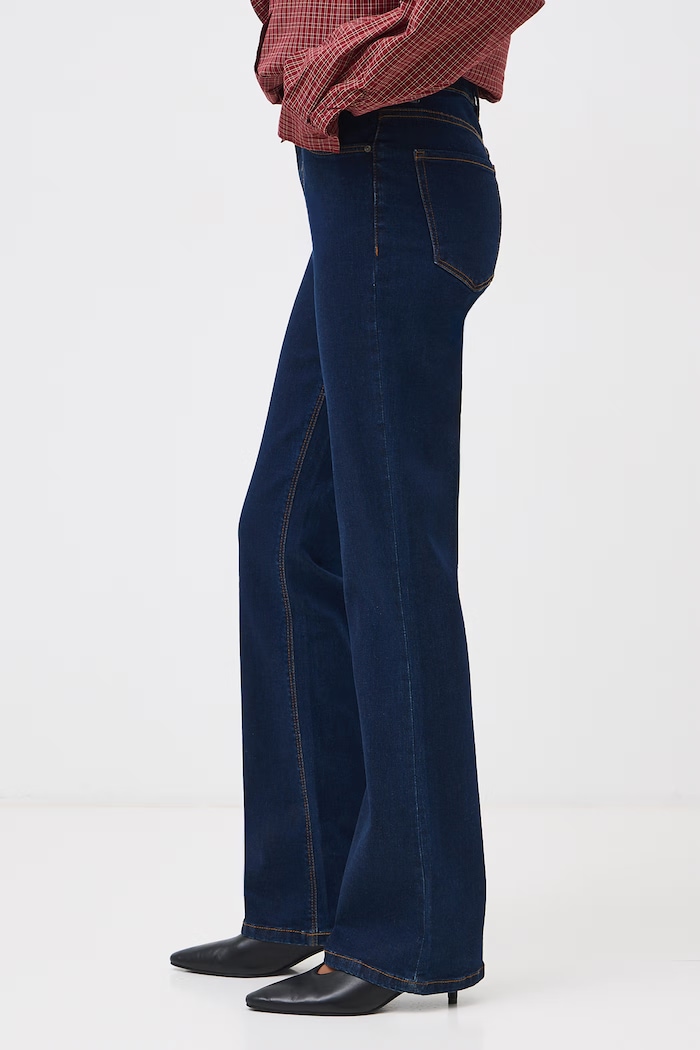Odzież Jeansy flare damskie z efektem sprania RW26-SJD501 granatowy