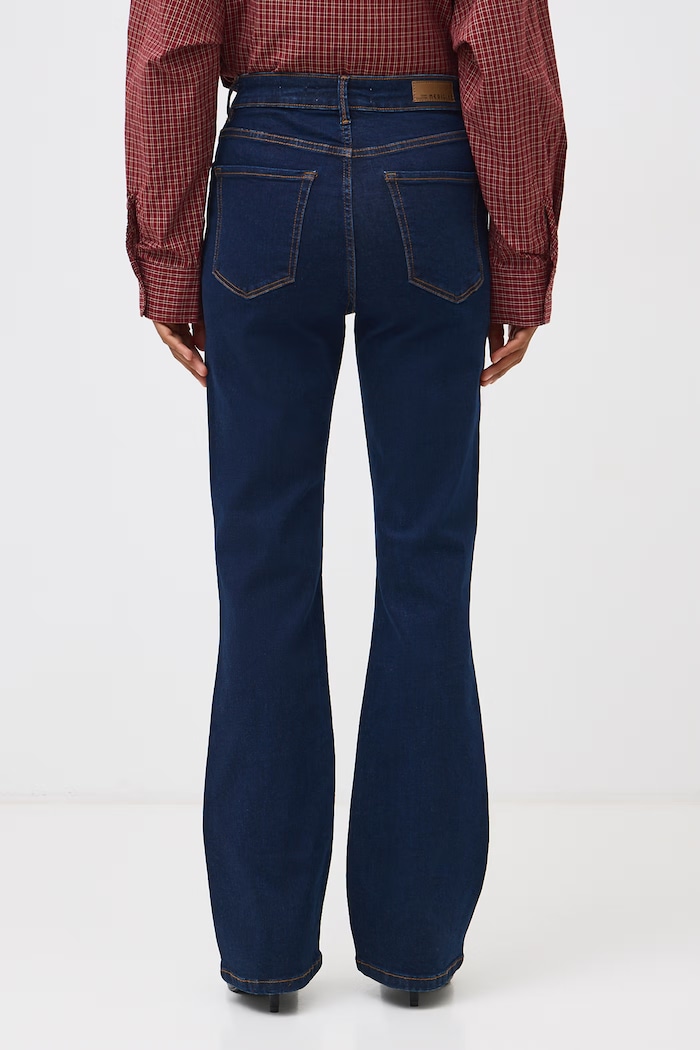 Jeansy flare damskie z efektem sprania RW26-SJD501 granatowy