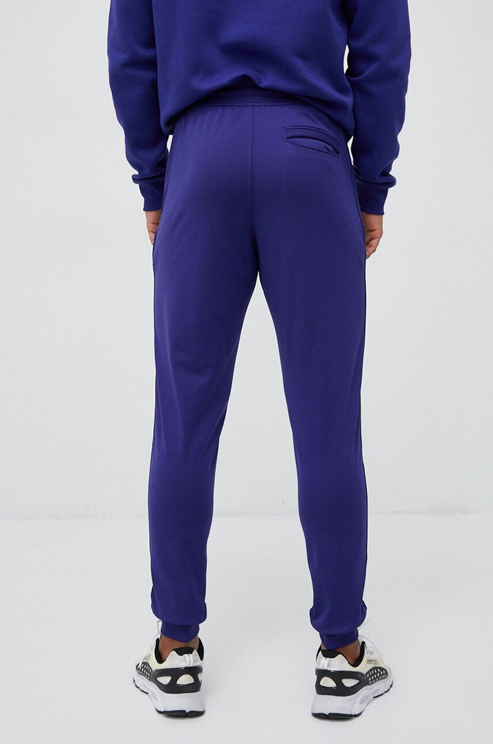Odjeća Donji dio trenirke Under Armour 1290261 ljubičasta