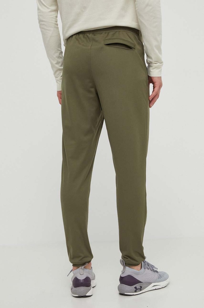 Îmbrăcăminte Under Armour Pantaloni de trening 1290261 verde