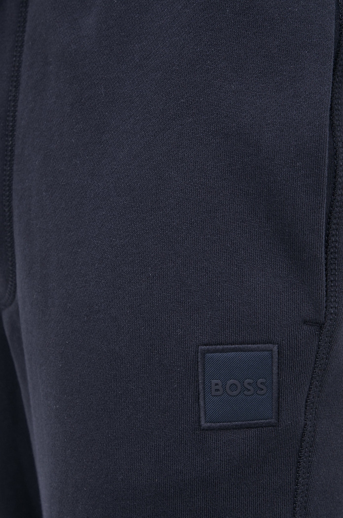Bavlněné tepláky BOSS Casual 50468448 námořnická modř AA00