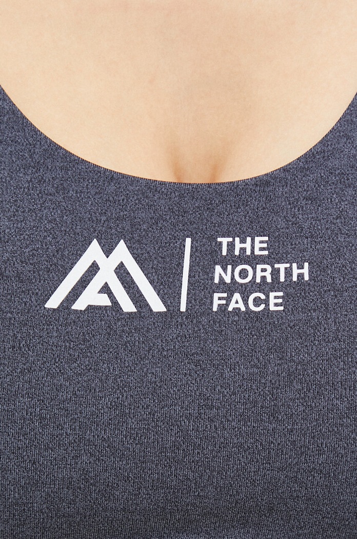 Sportovní podprsenka The North Face Mountain Athletics NF0A8259IV01 šedá