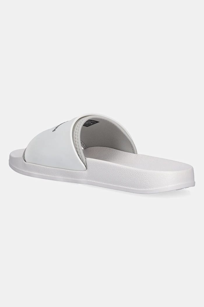 Obuwie Calvin Klein Jeans Klapki SLIDE MONOGRAM TPU YM0YM00361 biały