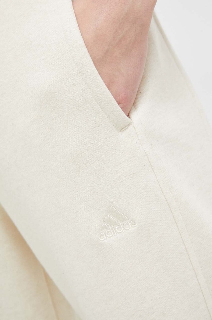 Oblečení Tepláky adidas IC6460 béžová