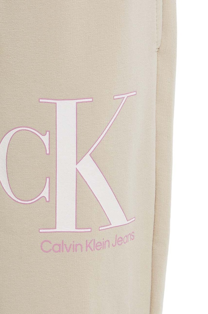 Dětské tepláky Calvin Klein Jeans béžová IG0IG01985.PPYX