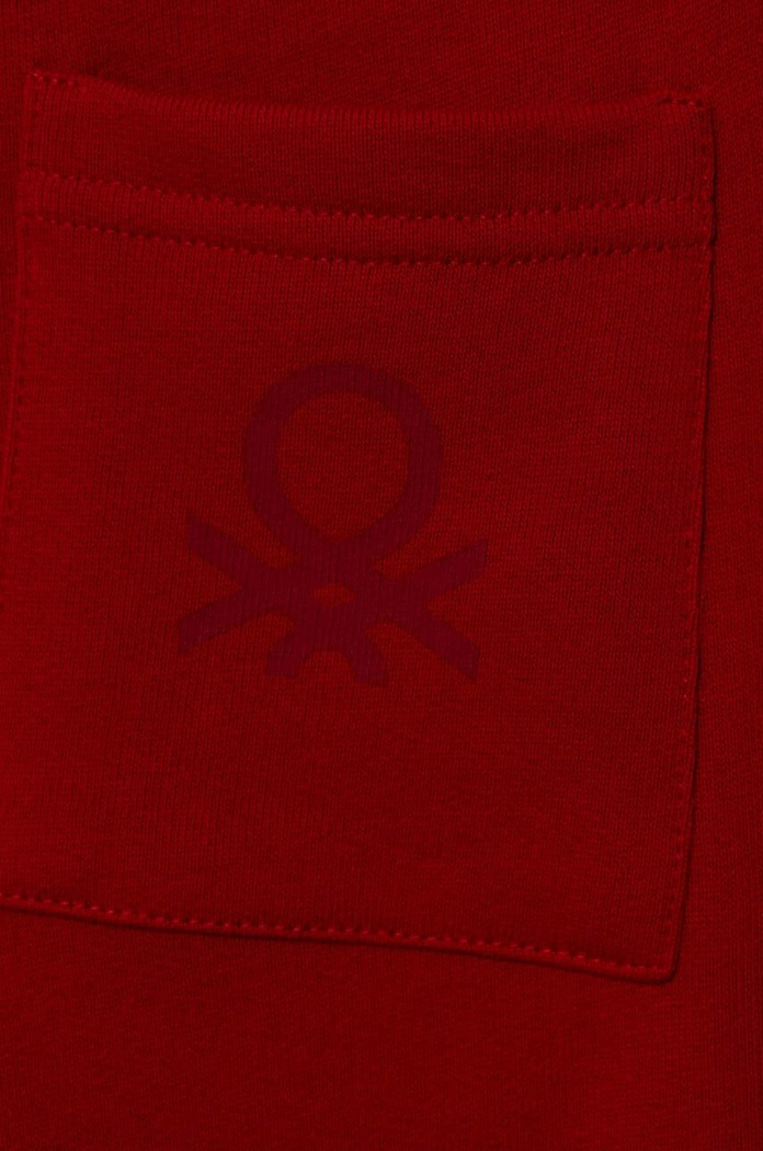 Chłopiec United Colors of Benetton spodnie dresowe bawełniane dziecięce 3J70GF010.P.SEASONAL czerwony