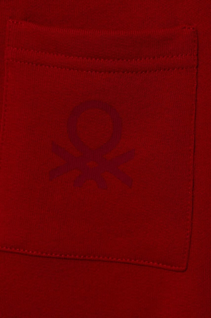 Chłopiec United Colors of Benetton spodnie dresowe bawełniane dziecięce 3J70GF010.P.SEASONAL czerwony