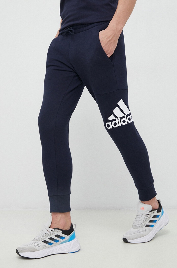 Bavlnené tepláky adidas bavlna tmavomodrá HA4344