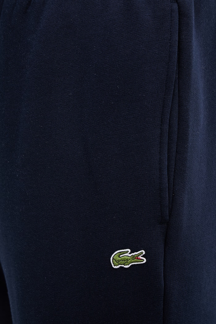 Tepláky Lacoste tmavomodrá XH9610