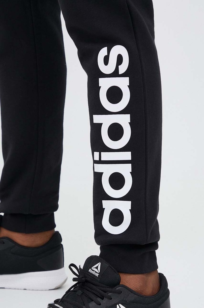 Bavlněné tepláky adidas černá IC0063