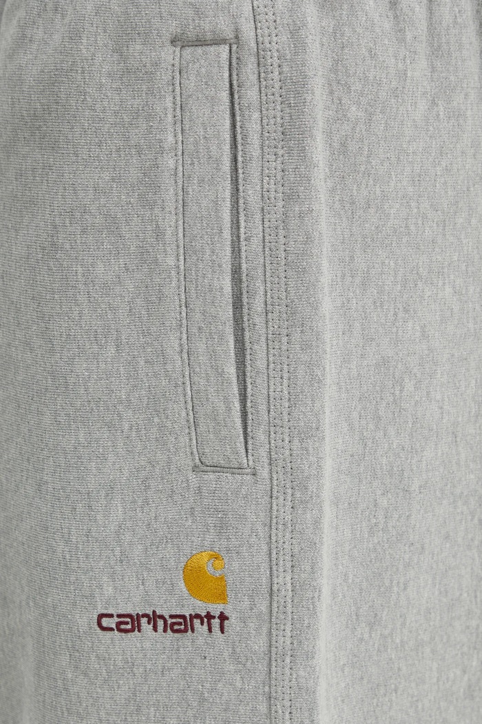 Donji dio trenirke Carhartt WIP American Script Jogging Pant siva I027042