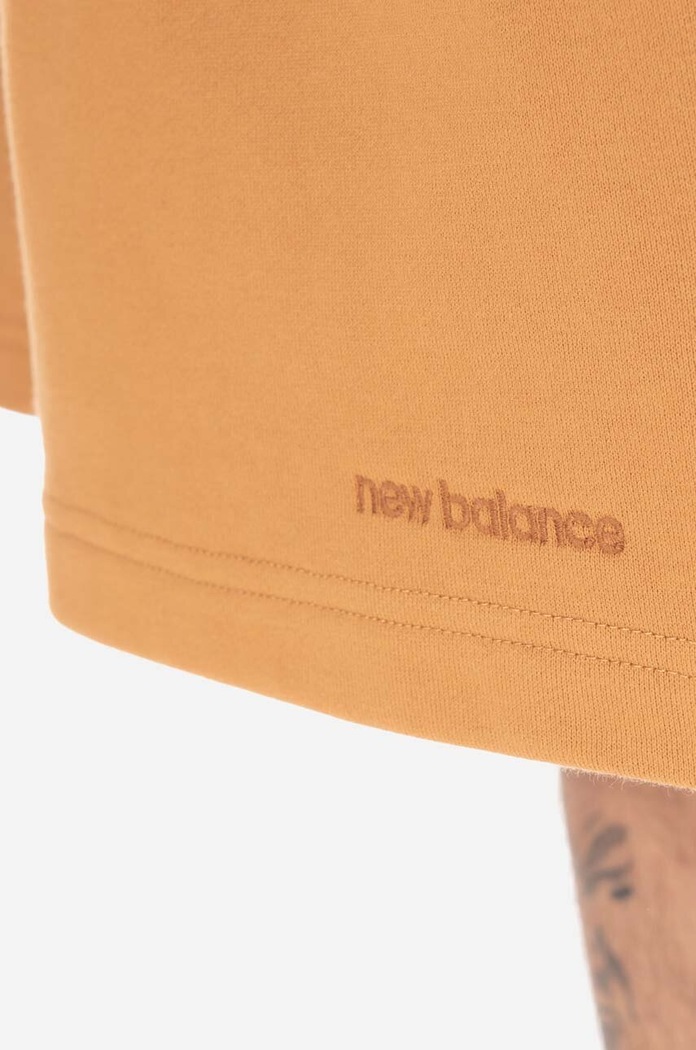 New Balance szorty bawełniane pomarańczowy MS23550TOB