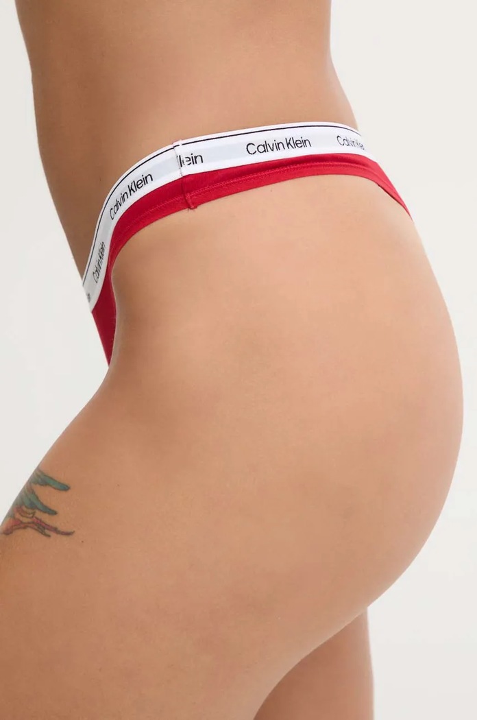 Calvin Klein Underwear tanga dámské bavlněné s elastanem 000QD5043E červená AA00