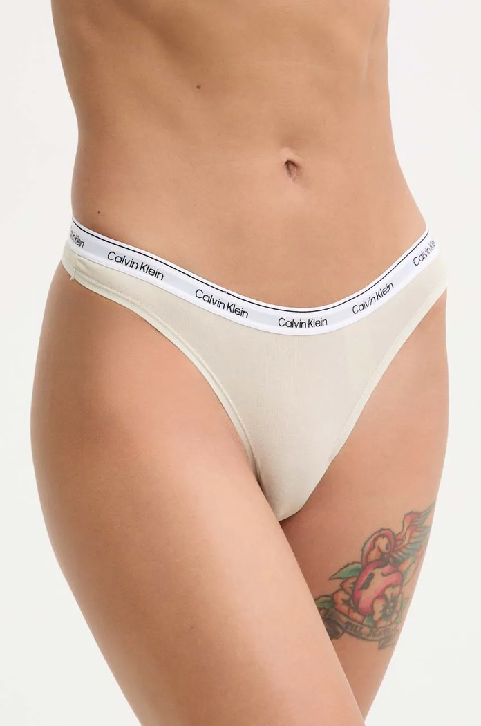 Calvin Klein Underwear tanga dámské bavlněné s elastanem béžová 000QD5043E