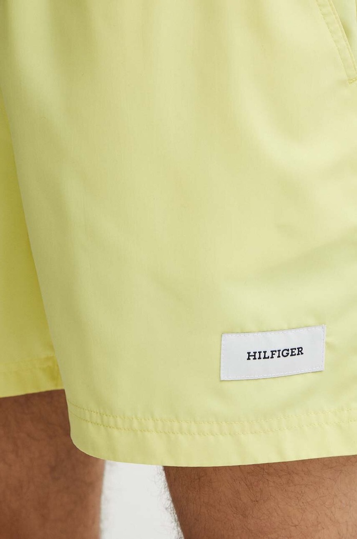 Plavkové šortky Tommy Hilfiger žlutá UM0UM03215