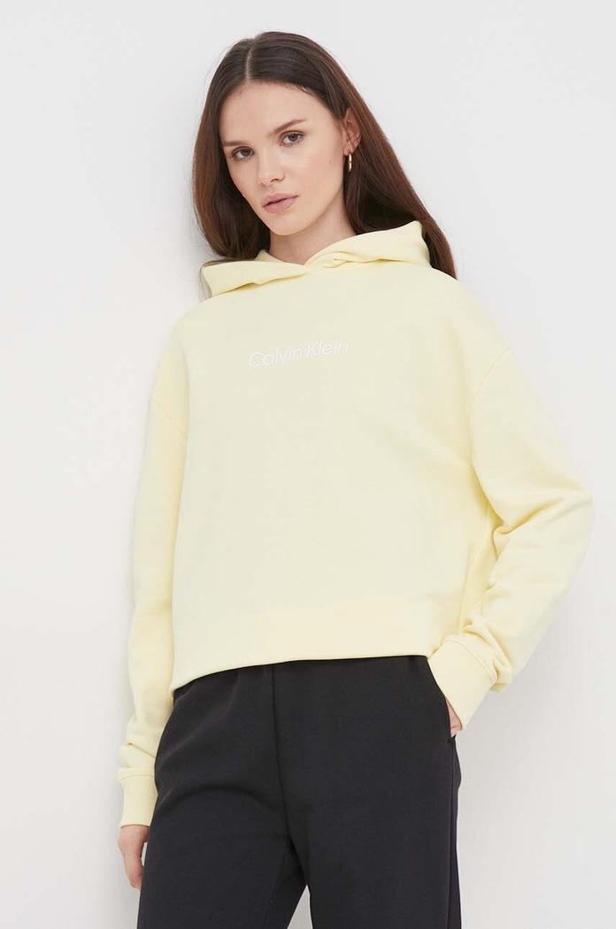 Bavlněná mikina Calvin Klein s kapucí žlutá K20K205449