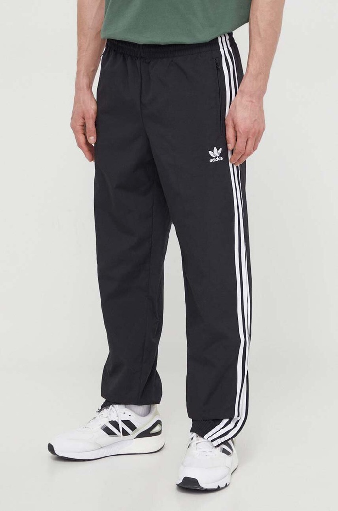 Hlače adidas Originals Adicolor Woven Firebird Track Top Planet friendly crna IT2501