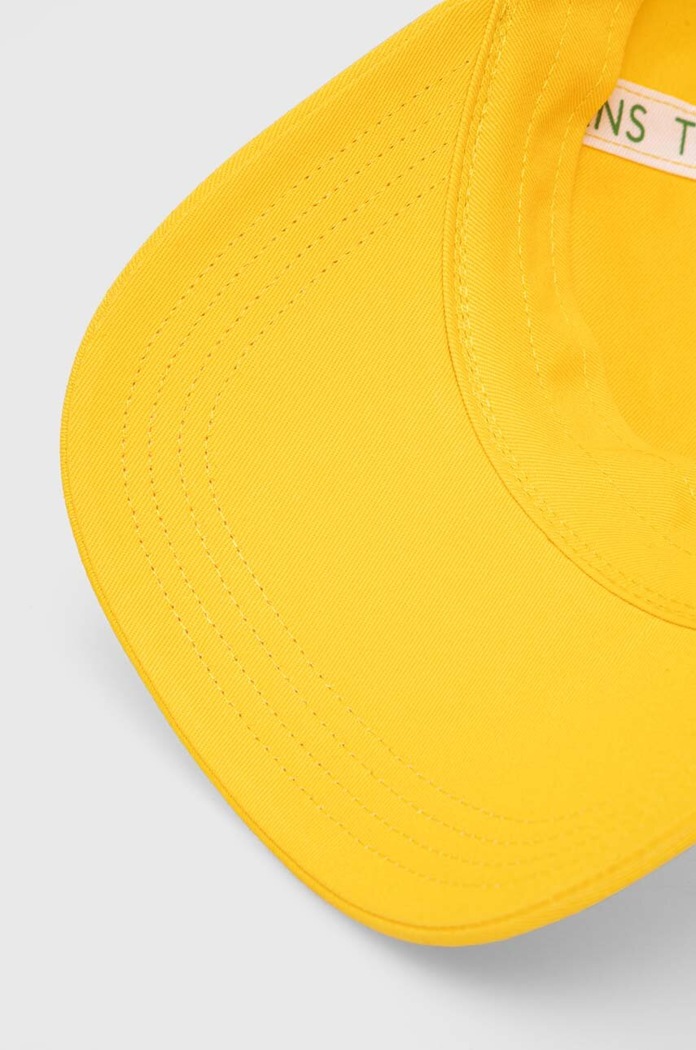 Czapka z daszkiem bawełniana Tommy Jeans AW0AW15842 żółty