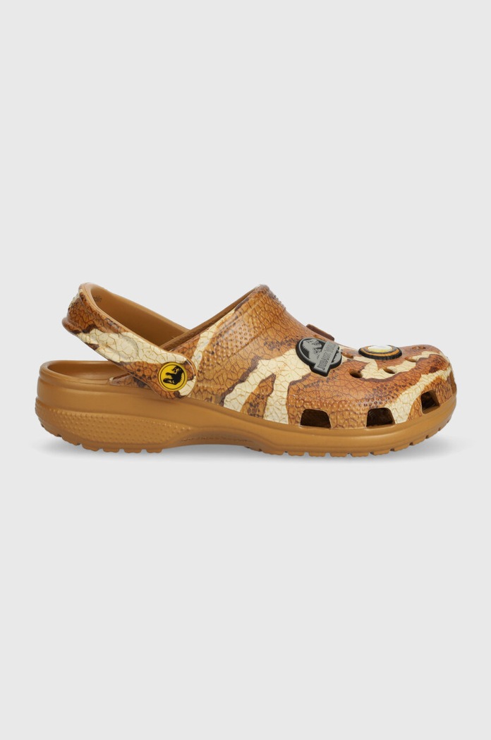 Dječje natikače Crocs JURASSIC WORLD CLASSIC CLOG 208808.CROCS.JURASSIC.W smeđa SS24