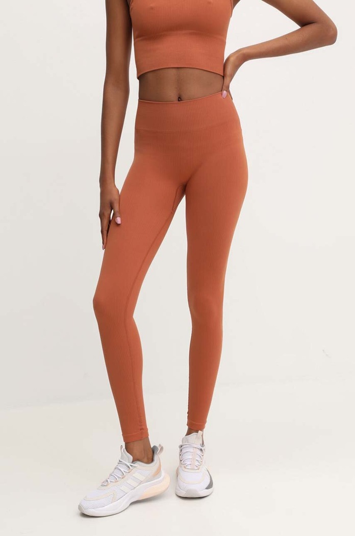 Tréninkové legíny Hummel hmlMT ADAPT SEAMLESS MW TIGHTS 223863 hnědá SS24